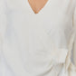 Mira’s White Wrap-Front Top